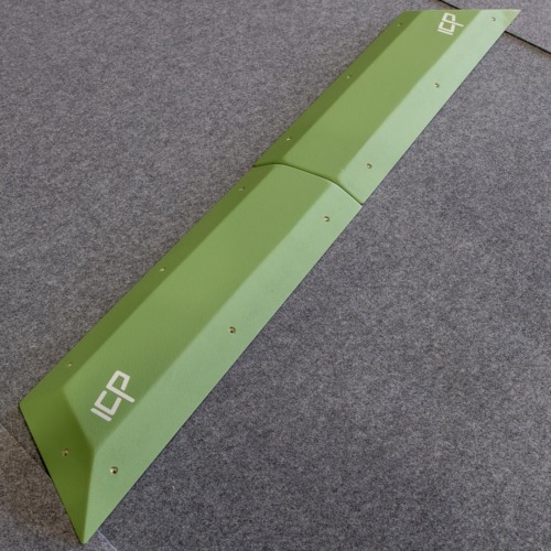 Photo of the Holly.H1.6-7 modular climbing rail volume resting on gym matting, ready for installation.