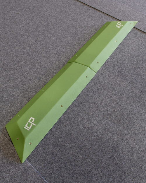 Photo of the Holly.H1.6-7 modular climbing rail volume resting on gym matting, ready for installation.