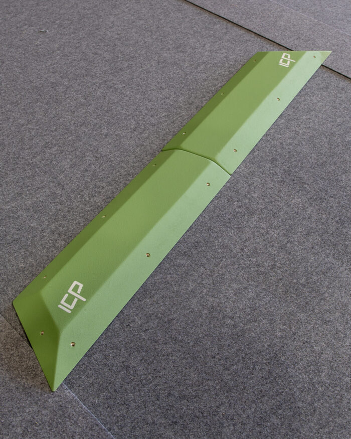 Photo of the Holly.H1.6-7 modular climbing rail volume resting on gym matting, ready for installation.