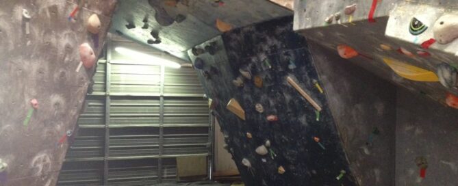 A climbing gym with old matting